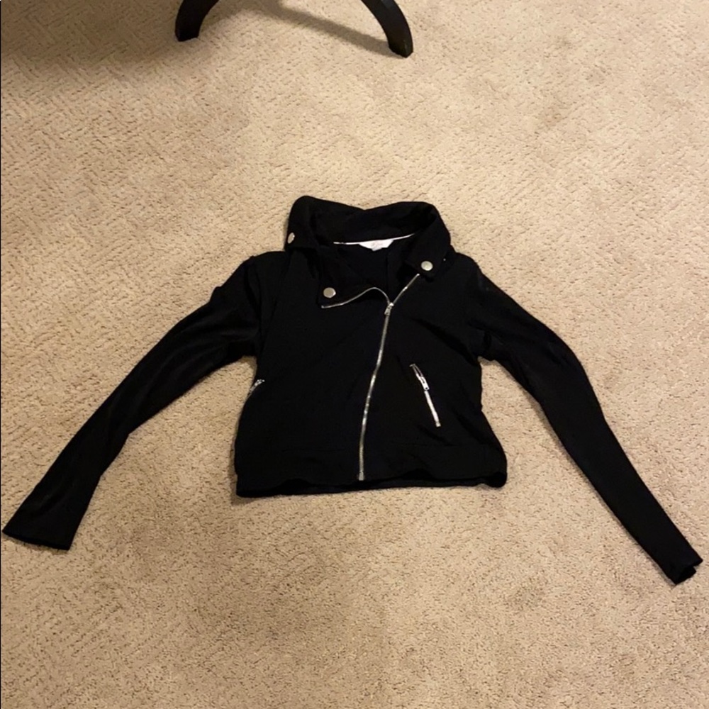 I am selling a black zip up jacket.